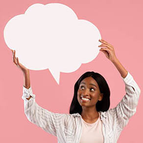 Woman holding cloud bubble above her head