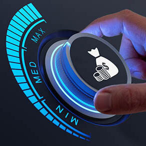 Saving money and growing capital financial concept with a hand on a dial with a money bag in the middle