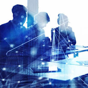 Silhouette of group of people working with dotted computer image over laid on it