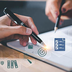 Close up of two people signing legal documents with images overlaid on top of picture