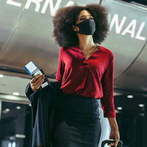 Woman walking through an airport