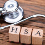 Blocks spelling out "H S A" next to a stethoscope