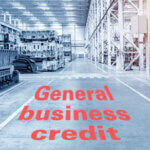 The interior of a big industrial building or factory with steel constructions