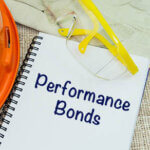 Performance Bonds wording written on notebook
