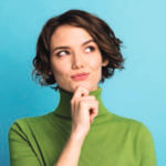 Close up of woman with her hand resting on her chin