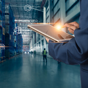 Business Logistics concept, Businessman manager using tablet check and control for workers with Modern Trade warehouse logistics. Industry 4.0 concept