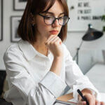 Business women determining the impact of fraud on business value