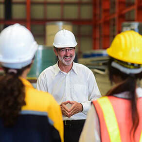 senior engineer is training engineering team in heavy industrial manufacture factory