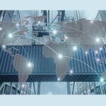 Manufacturing facility with world map laid over it