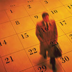 Man walking on a floor in orange portraying as a calendar