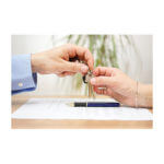 A man and woman exchanging keys