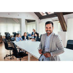 Man smiling at meeting