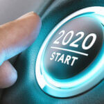 Round ignition button with 2020 with underscore and word start below that