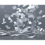 Pieces of gray and white paper flying around