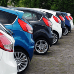 Backs ends of SUV's parked in a row