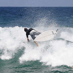 Man surfing taking a spill